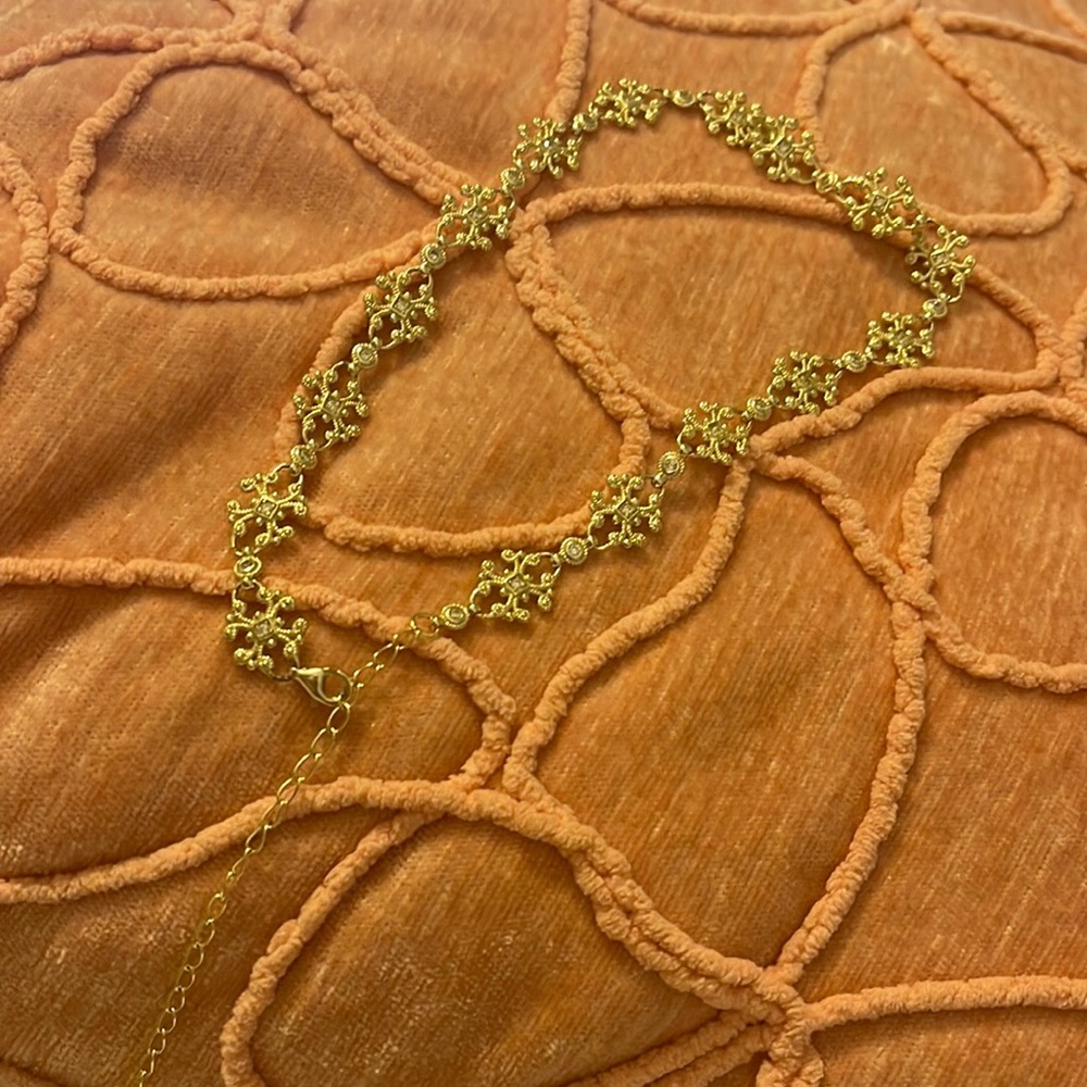 Gold tone choker with stone accents, very good quality, never worn